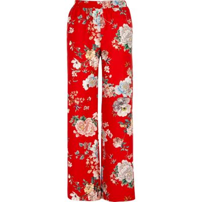 Red floral print wide leg trousers